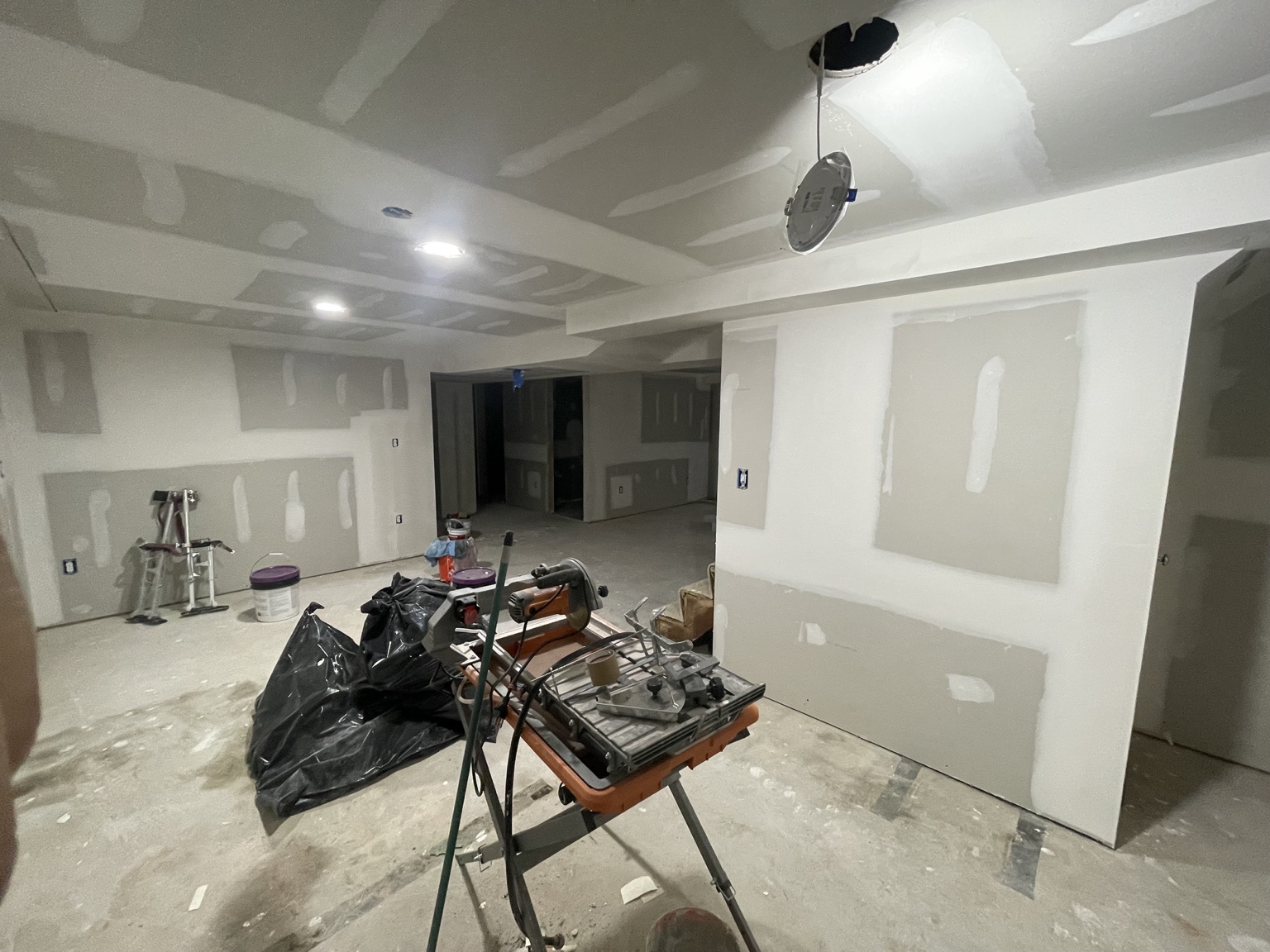 Basement drywall finishing in progress